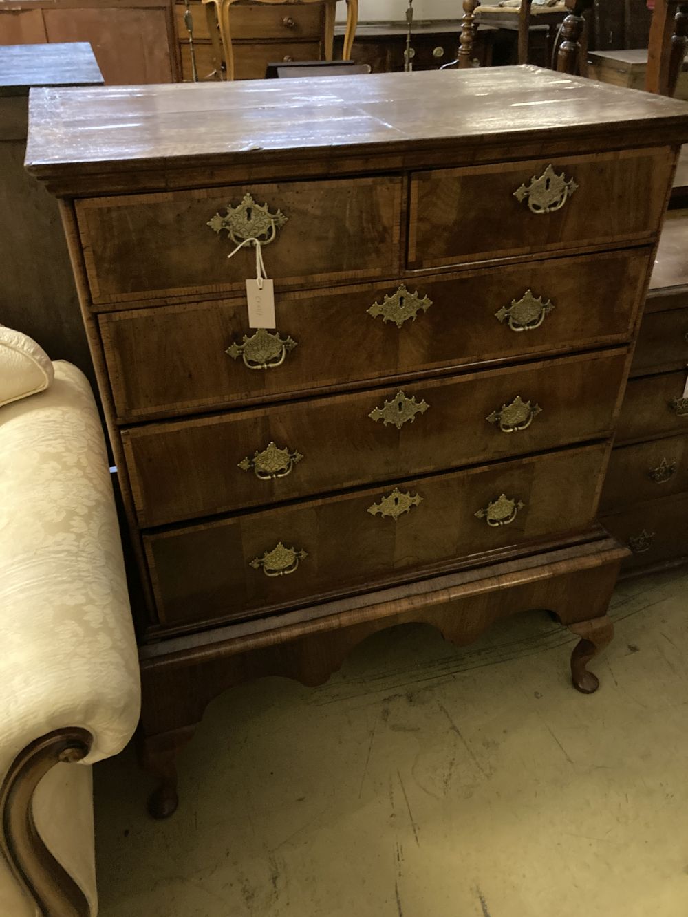 An 18th century walnut chest on stand, width 98cm, depth 56cm, height 122cm